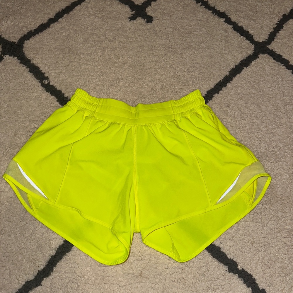 Highlight yellow 4 inch Lululemon Hotty Hot shorts